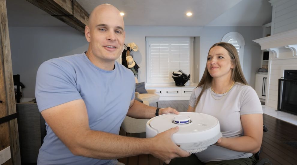 A gentleman and a Miss are recommending the narwal robot vacuum product. 