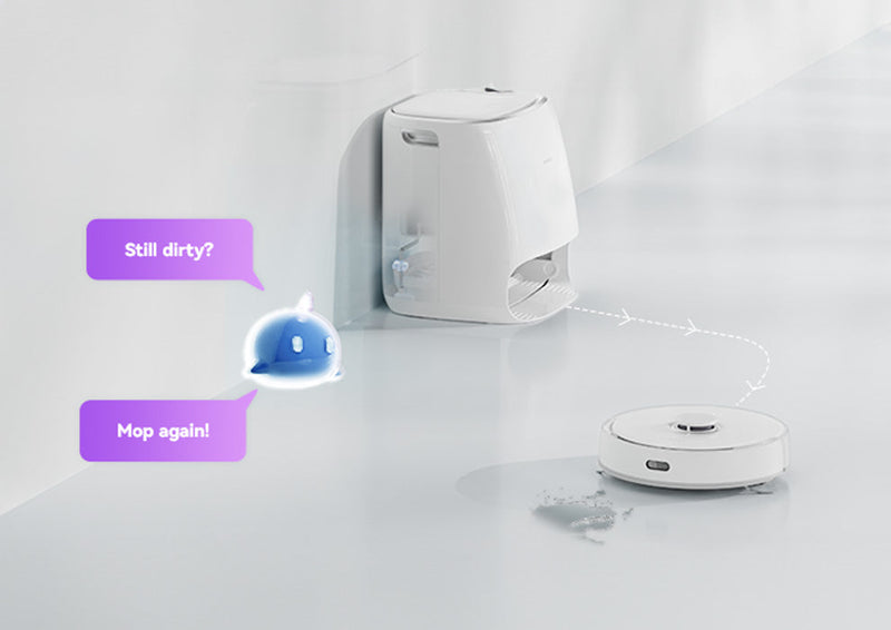Narwal Freo Versatile Self Mop Clean Robot on a white floor near the base station, with a virtual assistant bubble prompting the robot to mop again for a more thorough cleaning.