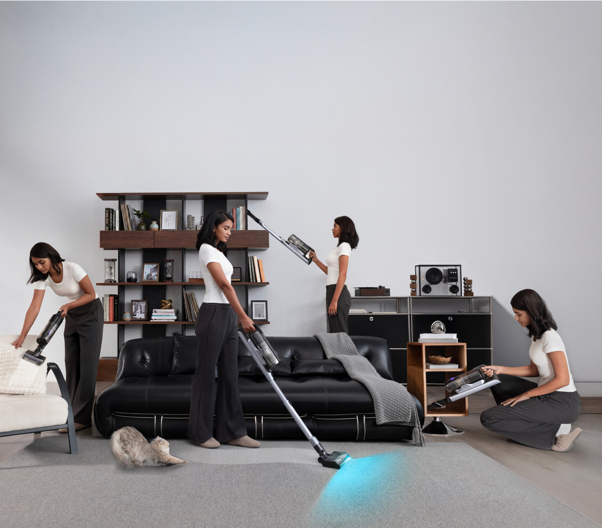 People using Narwal V50 Cube cleaning tools throughout a living room