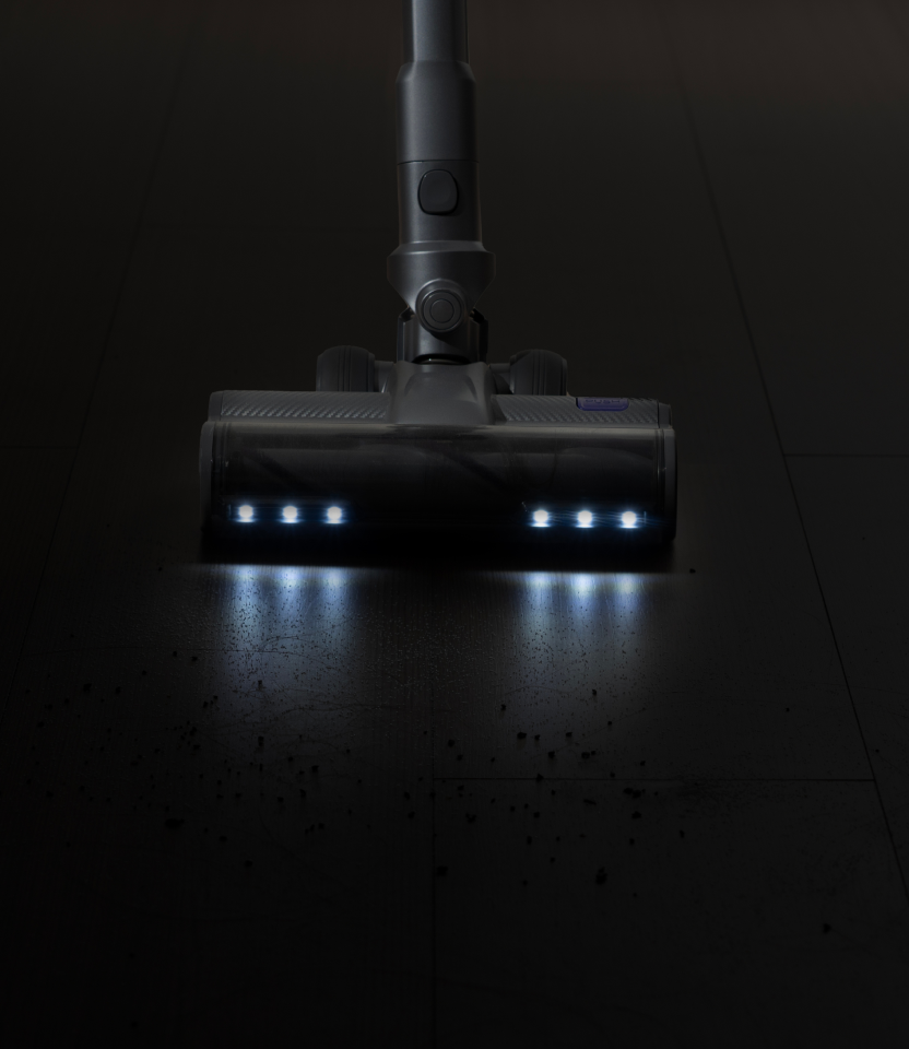Comparison vacuum with white lights above the floor