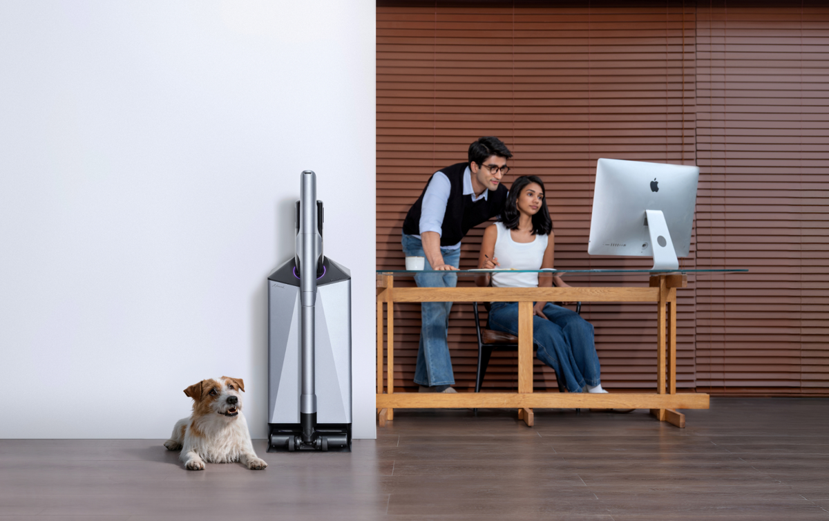Narwal V50 Cube station beside a home office and dog