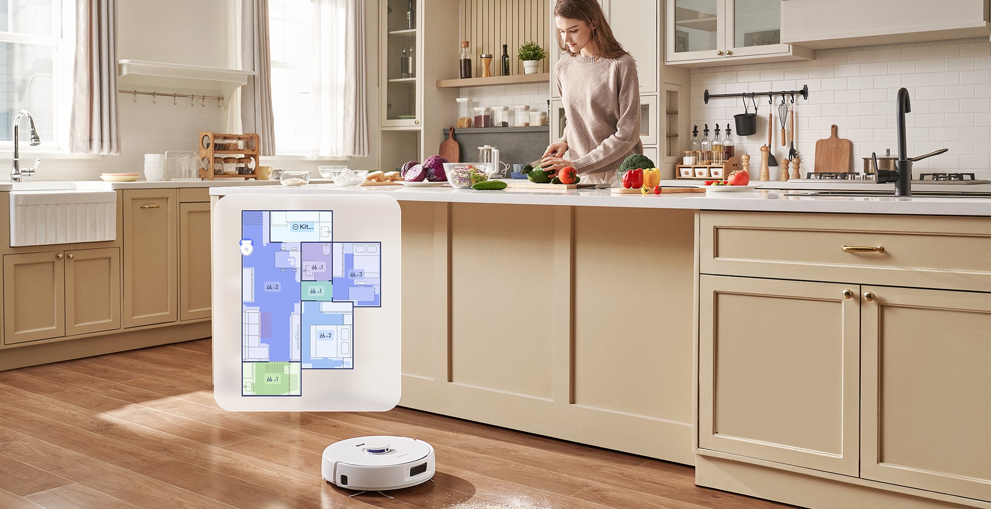 Narwal Freo X Plus Robot Vacuum shown cleaning a kitchen, with a displayed map of the home layout showing the vacuum's current cleaning progress.